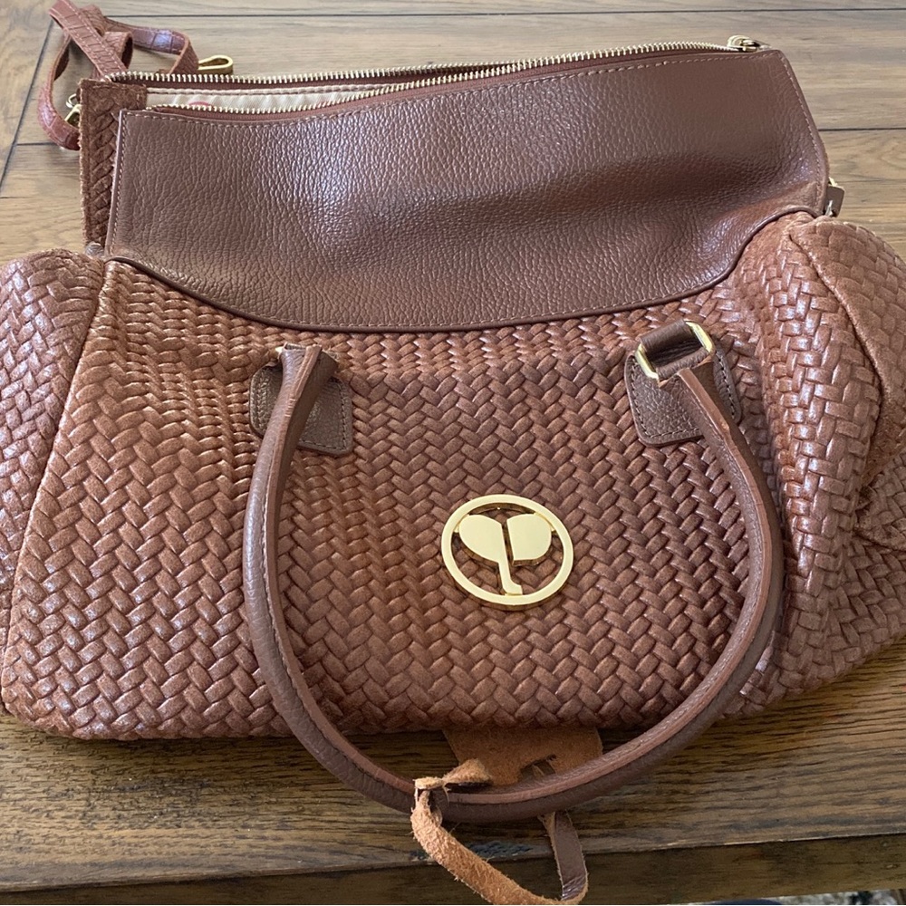 Designer Leather Italian Persaman New York crossbody bag.